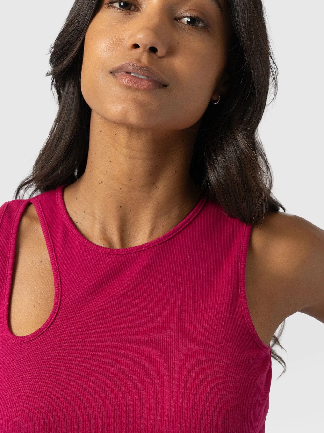 T-shirts & Tanks|Saint and Sofia Axel Cut Out Vest - Fuchsia Pink